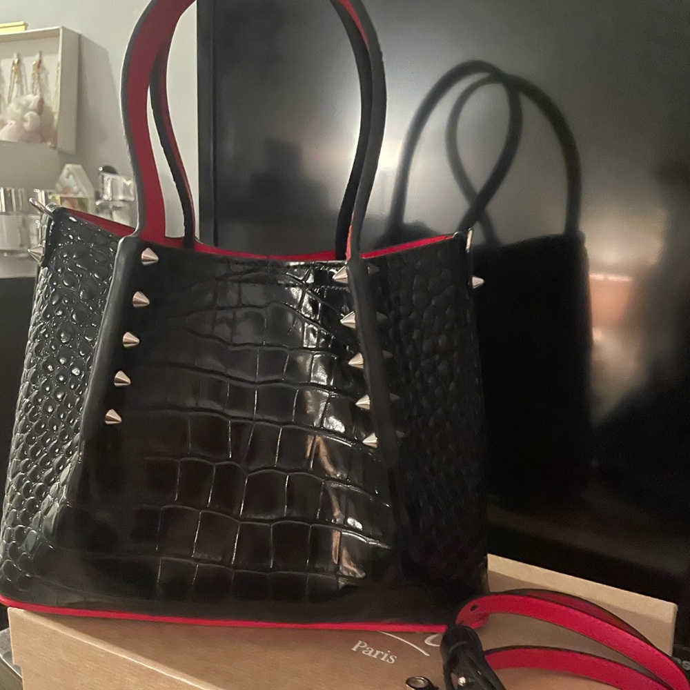 CHRISTIAN LOUBOUTIN 
Patent Embossed Spiked Mini Cabarock Shopper Tote